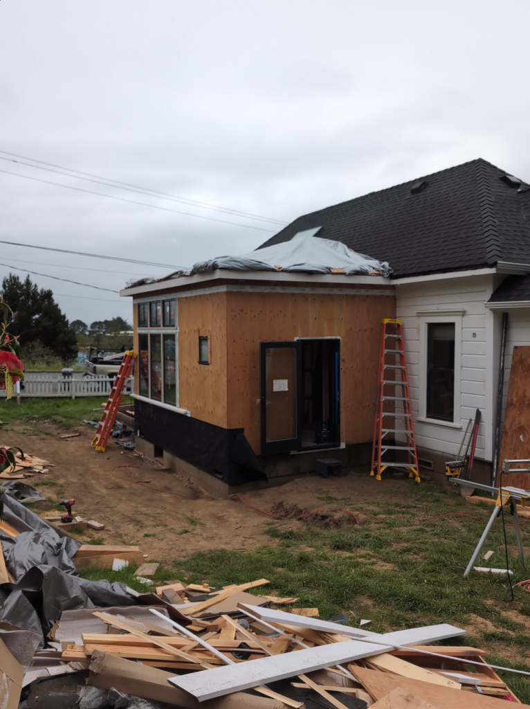 Exterior view of the addition to the historic Shotgun house.