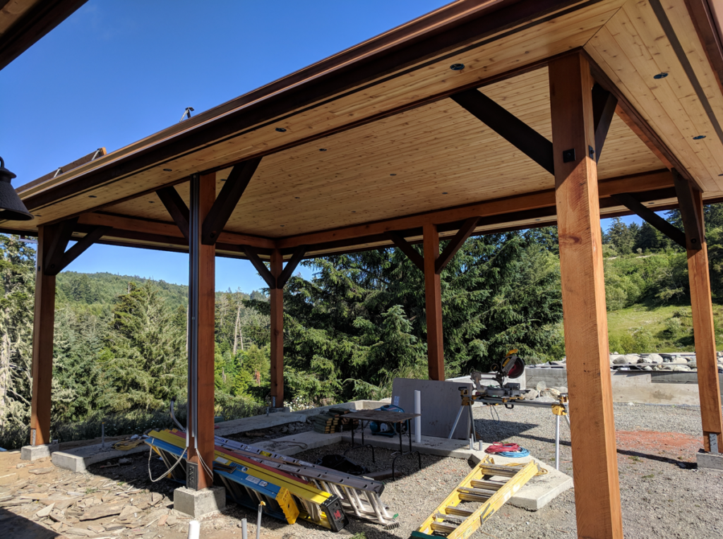 A large outdoor gazebo structure built on a sunny hill in Humboldt, California.