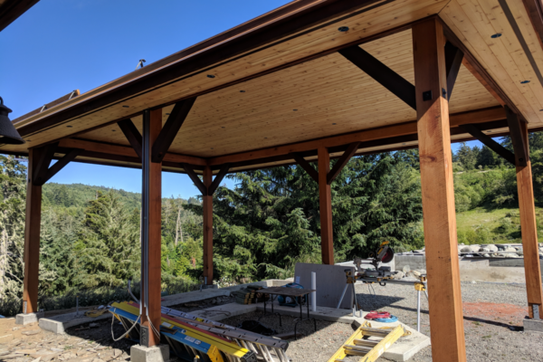outdoor-pergola A large outdoor gazebo structure built on a sunny hill in Humboldt, California.