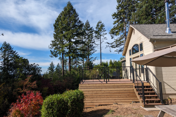 sunny-deck A beautiful, sunny deck built overlooking the hillside as an addition to the client's home.