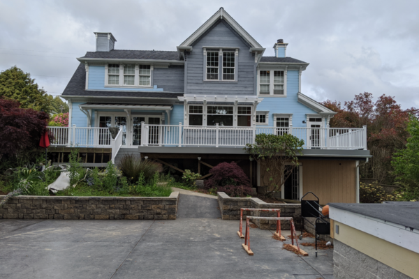 victorian-remodel Exterior view of the nearly completed Blue Victorian remodel, only awaiting paint on the siding to match the original blue color.