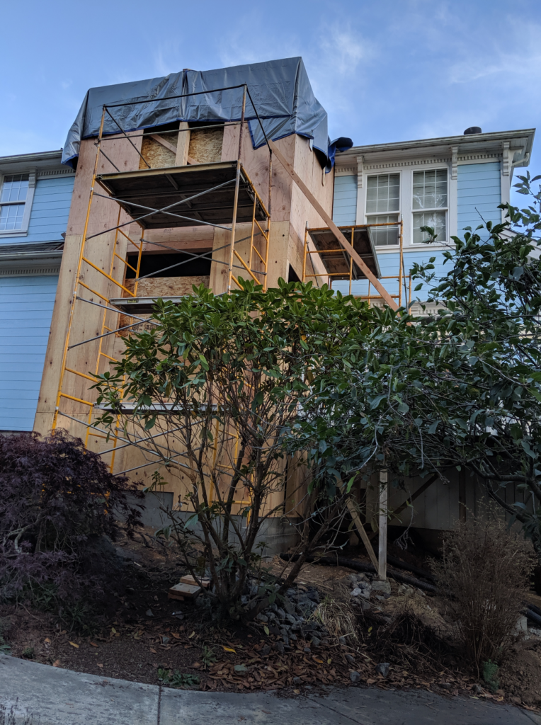 Exterior view of the scaffolding used to create the addition on the Victorian remodel.