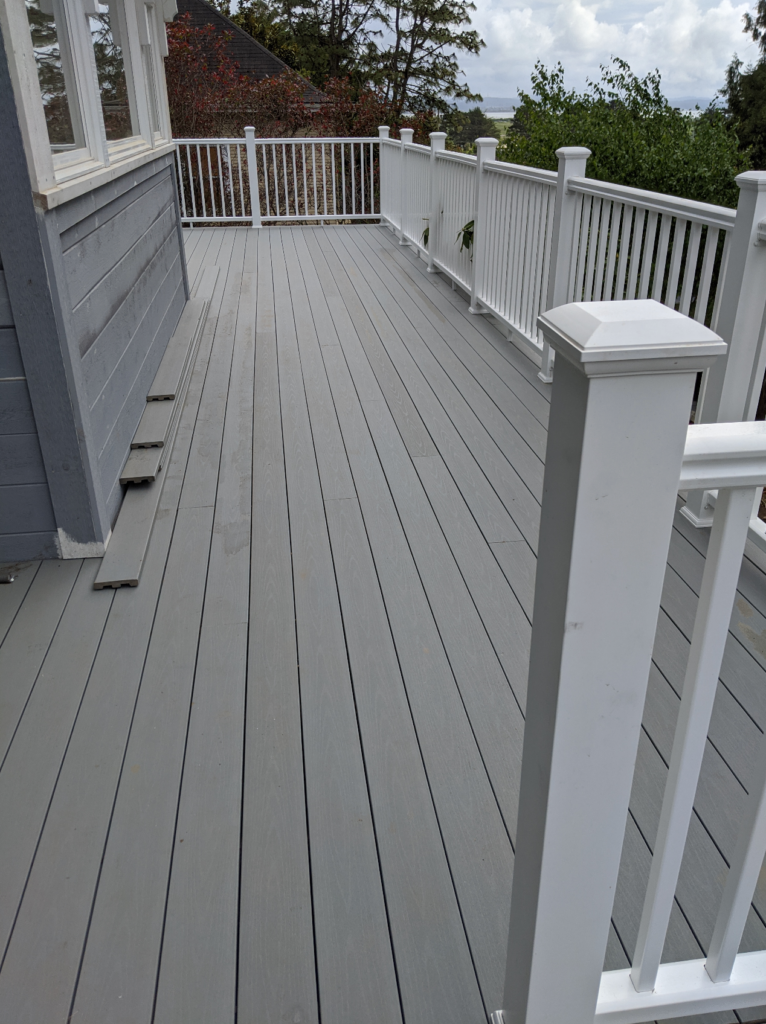 A view of the new deck and fencing added to the exterior of the Victorian remodel.